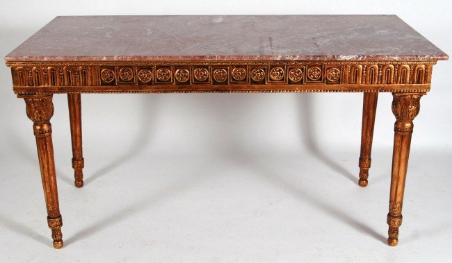 Neoclassical Gilt and Marble Top Console Table: Neoclassical gilt and marble top console table, 20th century. With rectangular marble top over rosette and molded apron set on fluted tapering legs. Height 31 1/2", length 60 1/2", depth 29 1/2".