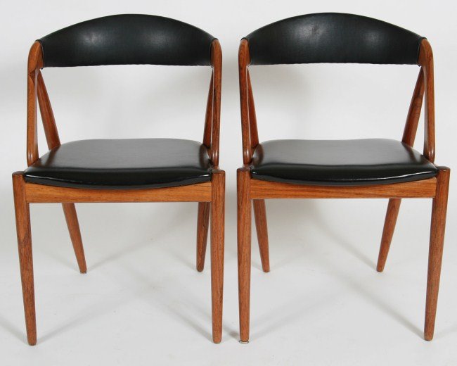 Pair Raymor Teak and Naugahyde Chairs, 20th C.: Pair Raymor teak and naugahyde side chairs. 20th Century. With metal tag. Height 29 1/2", width 19 1/2", depth 15". Provenance: from the estate of Stanford R. Ovshinsky.
