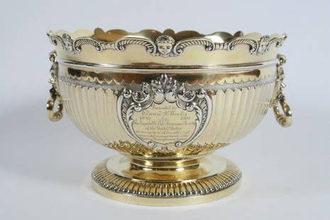 Victorian Silver Monteith, London, 1898, 146 Ozt.: Victorian silver monteith. London, 1898. By Elkington and Company. With shaped C-scroll border divided by putti masks above a fluted body centering a presentation cartouche engraved and dated "1899-19