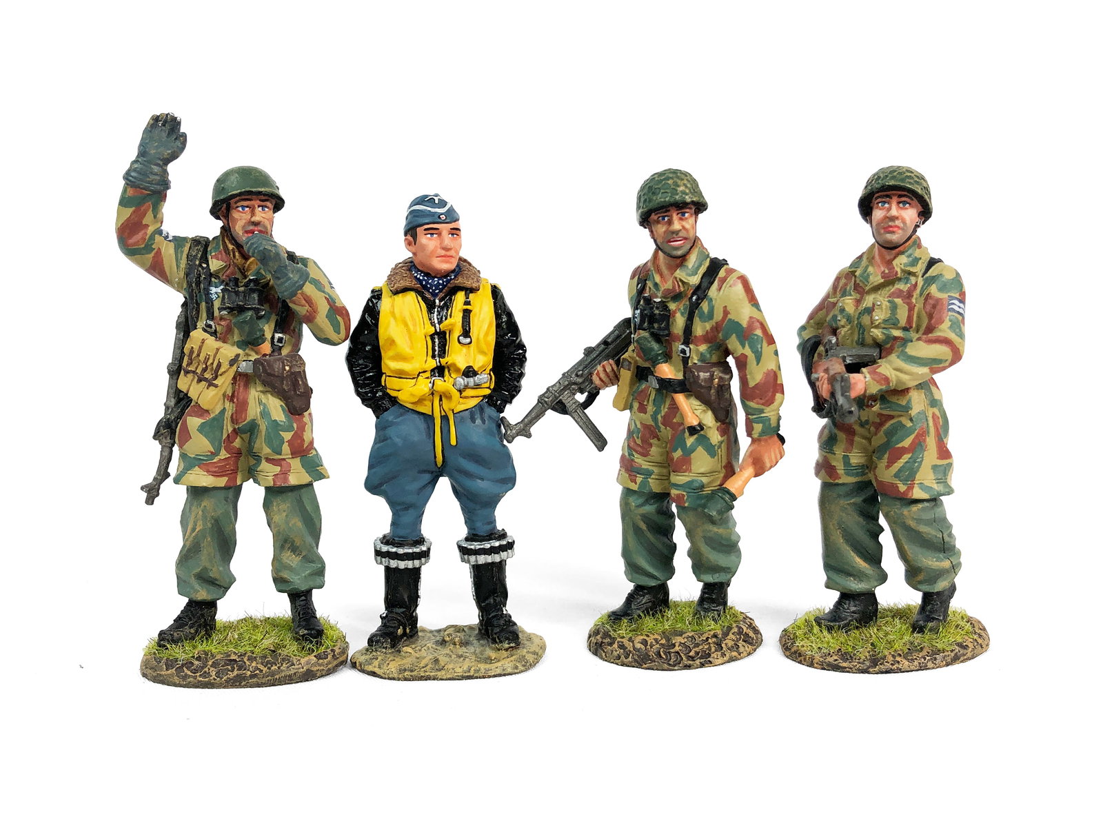 King & Country - Four Soldier Figurines: Lot includes: LW088 - FJ with MP40 & GrenadeLW087 - FJ NCO with Whistle LW085 - FJ with FG42 Assault Rifle LW002 - Major Werner Molders