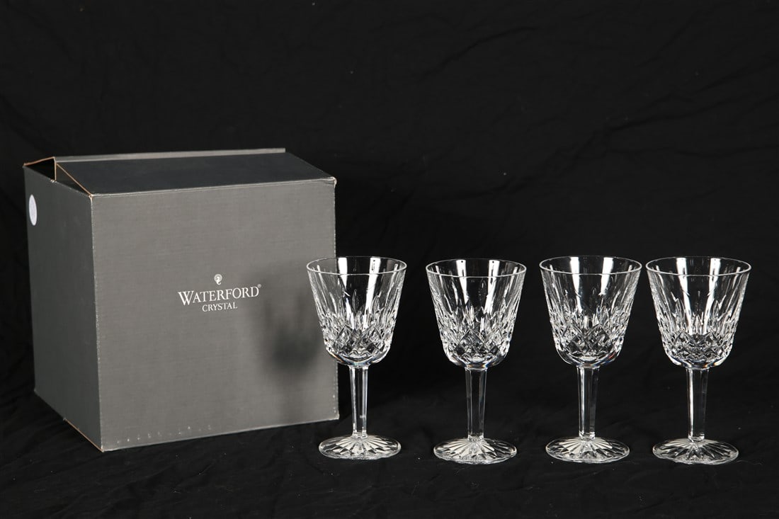 Waterford, Set of Four "Lismore" Claret Glasses: Waterford (Irish, established 1783). "Lismore". Crystal. Height: 6". Set of four Waterford "Lismore" crystal claret glasses with box. New with labels to the undersides.