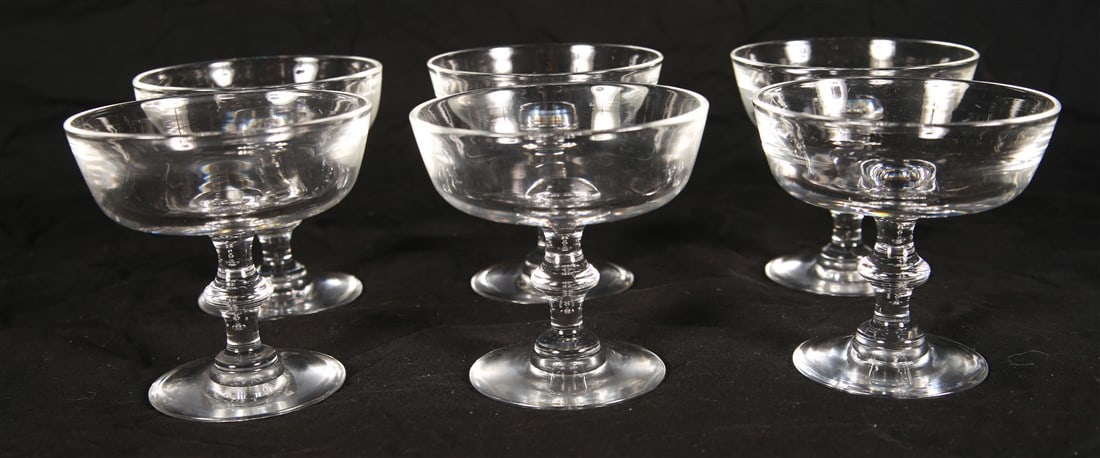 Steuben, Set of Six Champagne/Tall Sherbet Glasses: Steuben Glassworks (American, established 1903). Champagne/tall sherbet glasses. Crystal. Pattern: 7725. Height: 3 7/8". Steuben, set of six champagne/tall sherbet glasses. Etched "Steuben" to the und