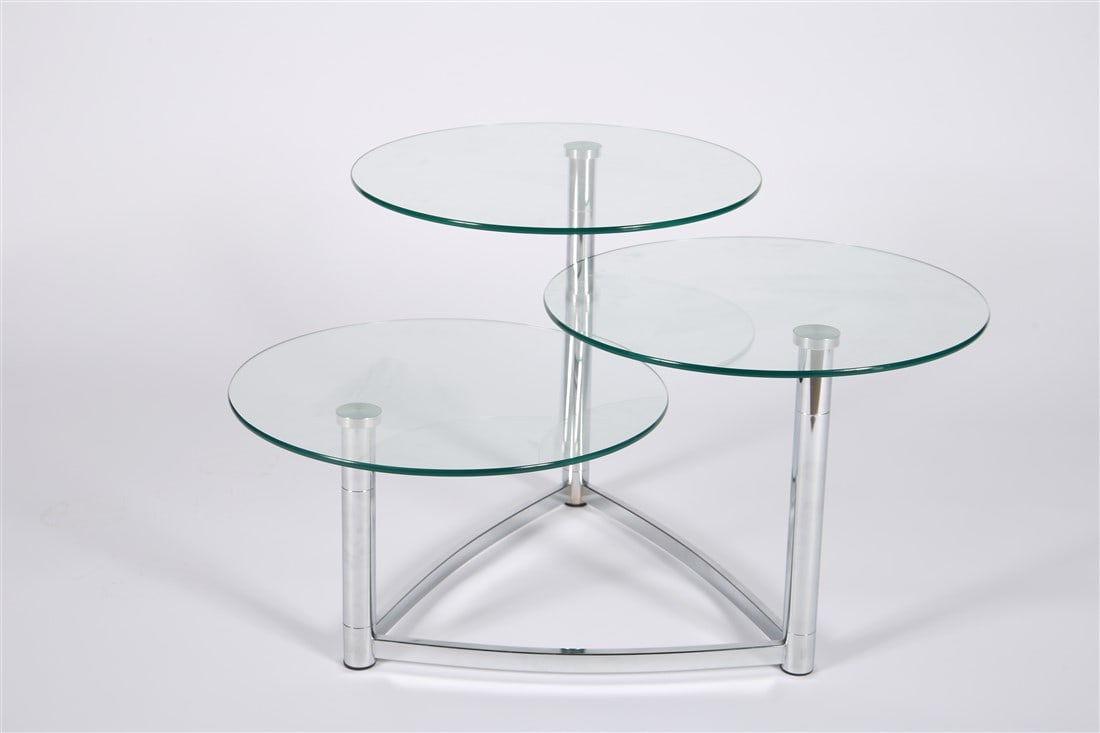 Cascade, Three-Tier Glass Swivel Table: Cascade. Chromed metal, glass. Height: 20 1/4", Length: 31", Depth: 31" (variable). Chromed metal cantilever three-tier glass swivel table. Two sections swivel out for customizable positioning.