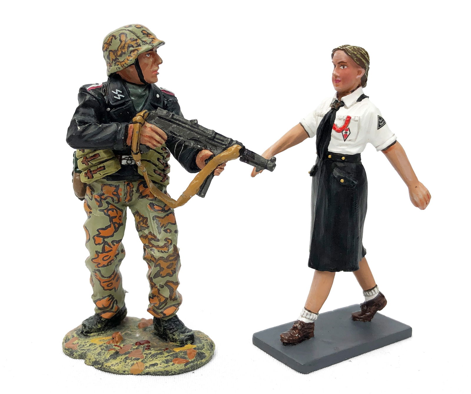 King & Country - Two Figurines: Painted metal. One figurine is a WW2 German army soldier; the other appears to be a member of the Hitler Youth.
