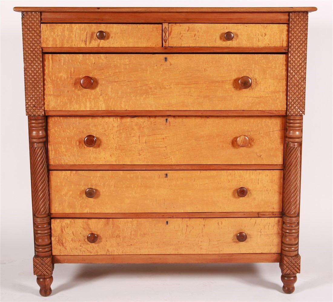 Empire Style Bird's Eye Maple Bonnet Chest: Bird's eye maple, cherry. Height: 52 1/2", Length: 51", Depth: 20 1/4". American Empire style bird's eye maple and cherry bonnet chest. Six drawers with large second tier drawer for hats. Round wood p