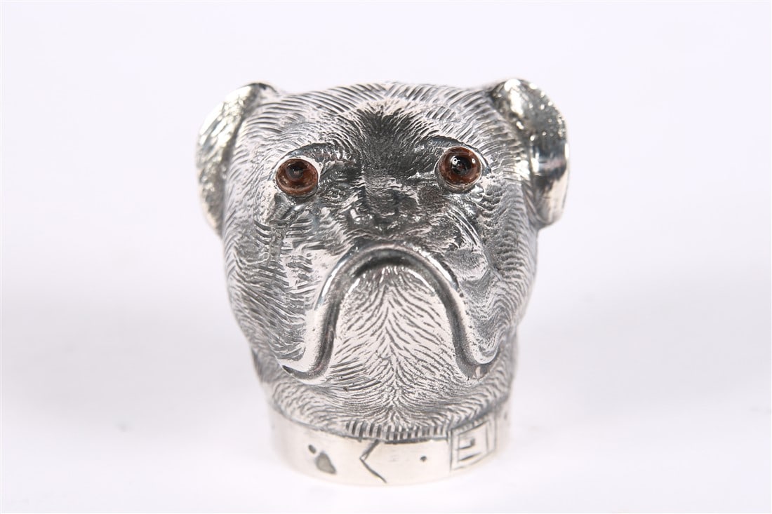 Silver Plated Dog Head Bottle Opener: Silver plate. Height: 2 1/4", Length: 2 1/2", Depth: 2 1/4". Silver plated dog head bottle opener. Stamped illegibly to the underside.
