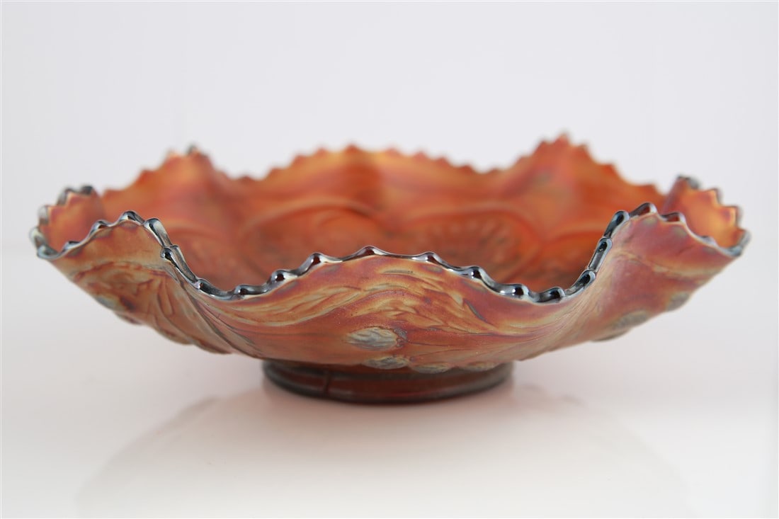 Fenton, Peacock and Grape Carnival Bowl: Fenton Glass (American, 1905-2017). Glass. Height: 2 1/2", Diameter: 9". Fenton carnival glass bowl with a peacock and grape design. Ruffled edges.