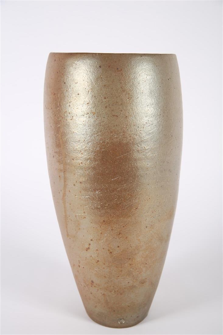 Joanna Constantinidis, Ceramic Asymmetrical Vase: Joanna Constantinidis (English, 1927-2000). Stoneware. Height: 15 1/4", Diameter: 8 1/4". A stoneware vase with a metallic gradient finish by Joanna Constantinidis. Impressed with artist seal at botto
