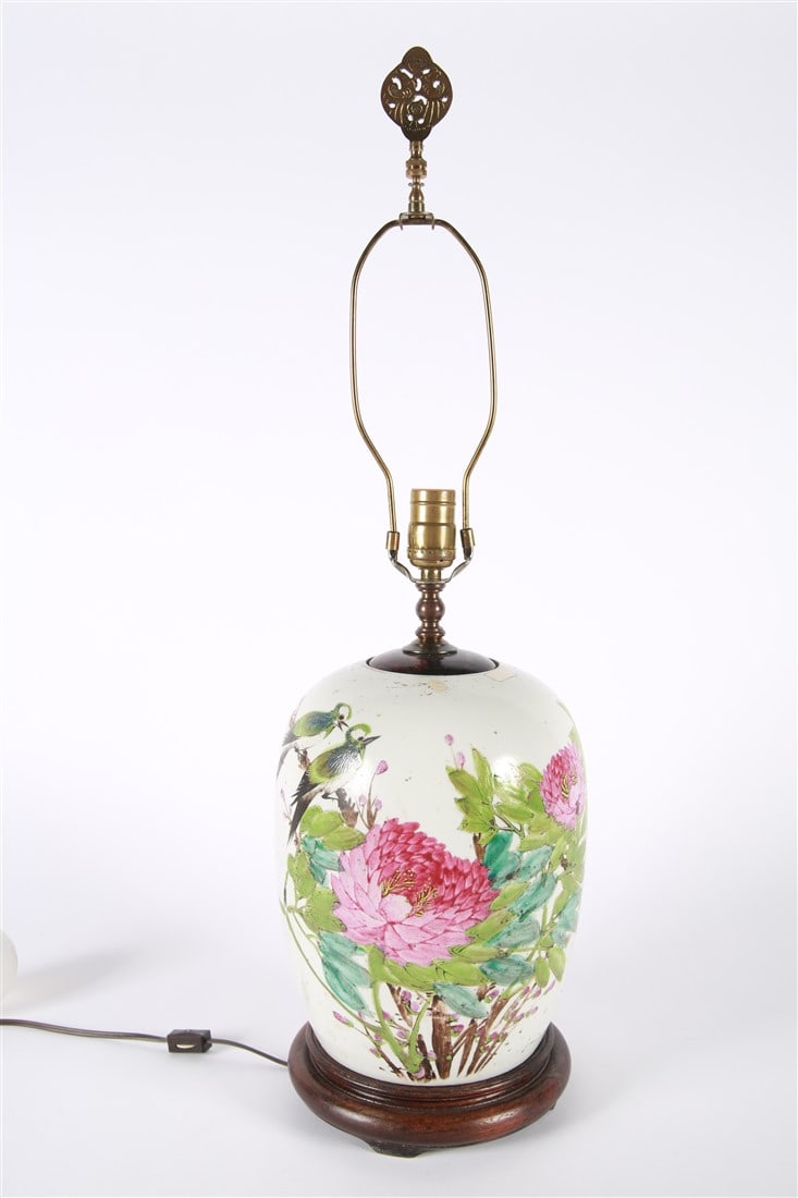 Chinese Vase Table Lamp: Porcelain, brass, wood. Height: 30", Diameter: 7 1/2". Lamp made of a Chinese vase on a wood base with metal finial. Functional.