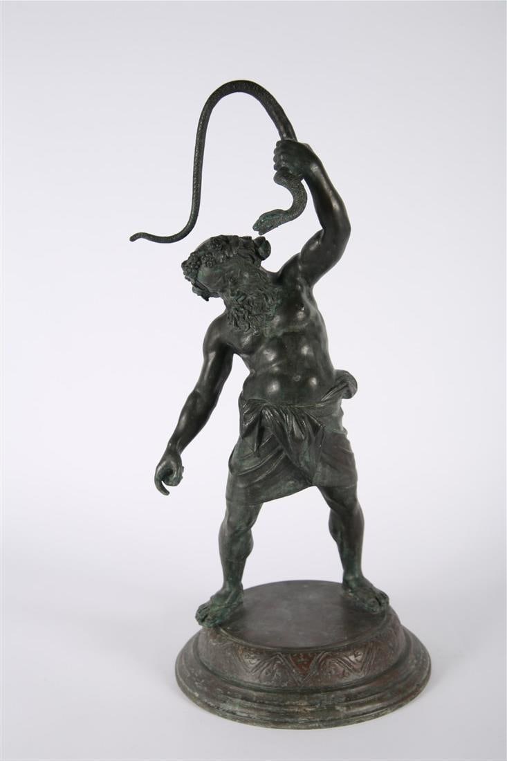 Maitland-Smith, Statue of Apollo and Python: Maitland-Smith. Cast metal. Height: 23 1/2", Diameter: 10". Cast metal statue depicting Apollo and Python.