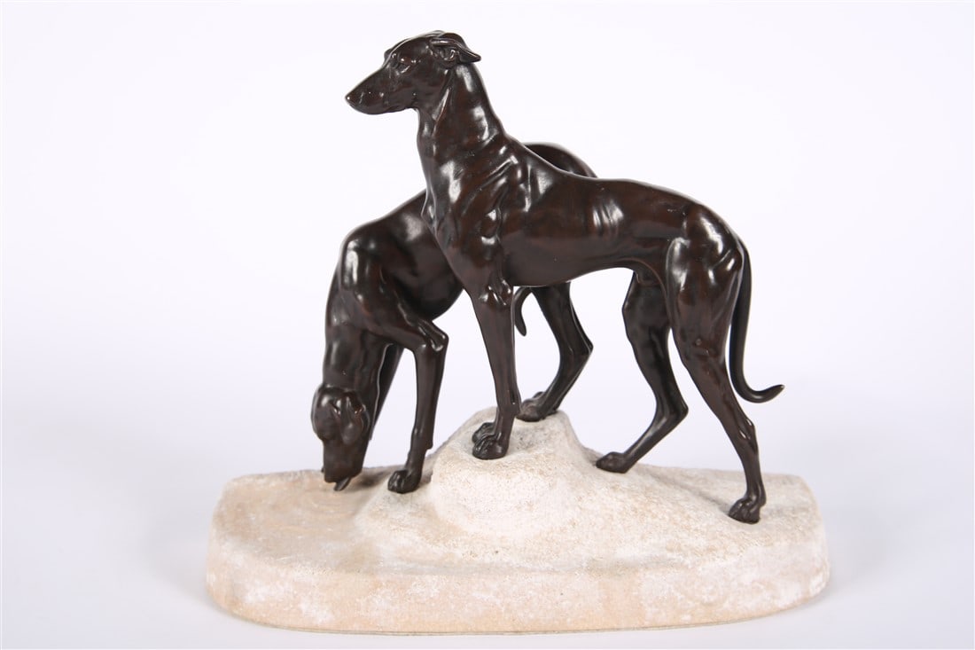 After Masson, Bronze Dogs Sculpture: After Jules Edmond Masson (French, 1871-1932). Bronze, cement. Height: 11 1/4", Length: 13 1/4", Depth: 4 1/2". After Jules Edmond Masson, sculpture depicting two bronze dogs mounted in a cement