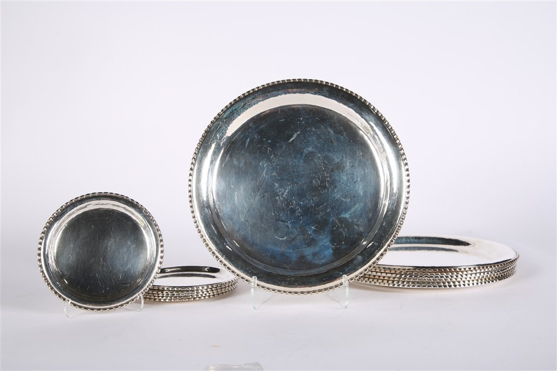 Georg Jensen, Sterling Silver Beaded Edge Plates: Georg Jensen (Danish, established 1904). Sterling silver. Model 290. Larger plates: Diameter: 10 1/4". Smaller plates: Diameter: 5 3/4". Total weight of all: 125.075 ozt. Georg Jensen, collection of t