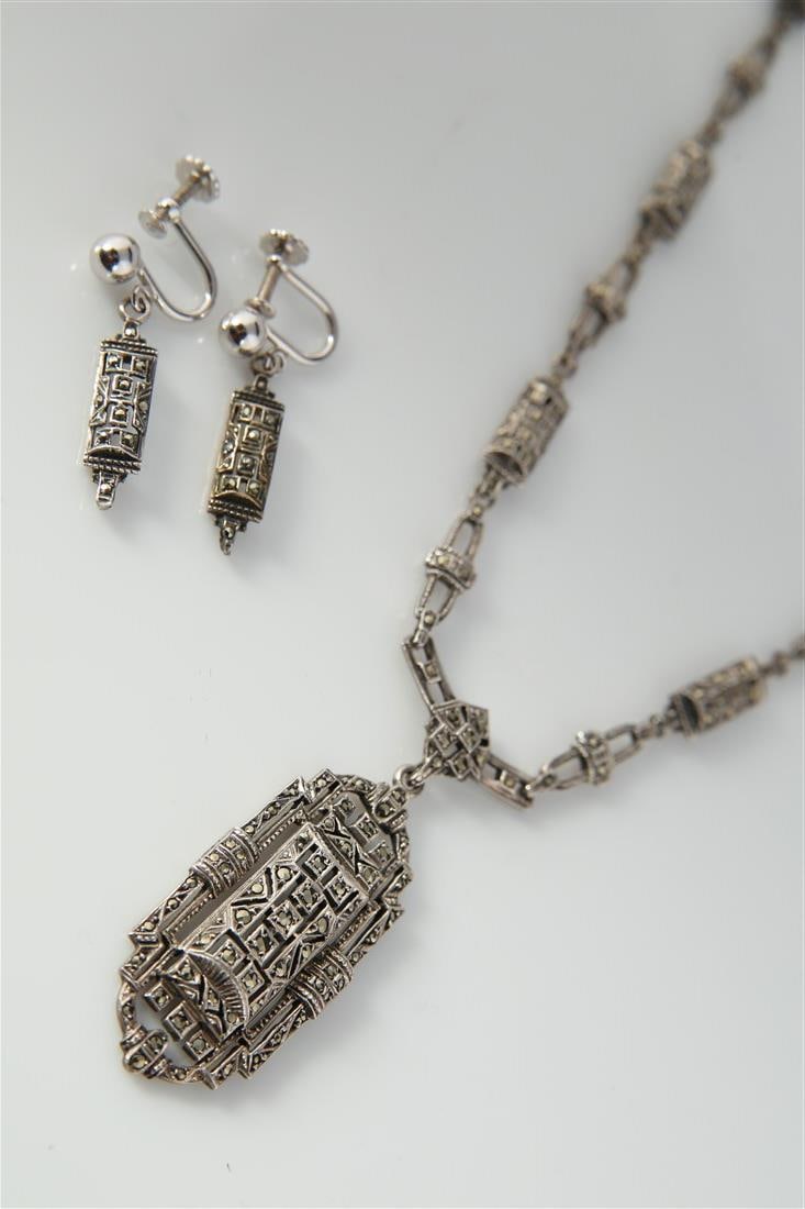 Marcasite and Sterling Necklace and Earrings: One sterling silver marcasite fancy link necklace and one pair of sterling silver marcasite screwback dangle earrings. Necklace and earrings weigh a total of 28 grams.