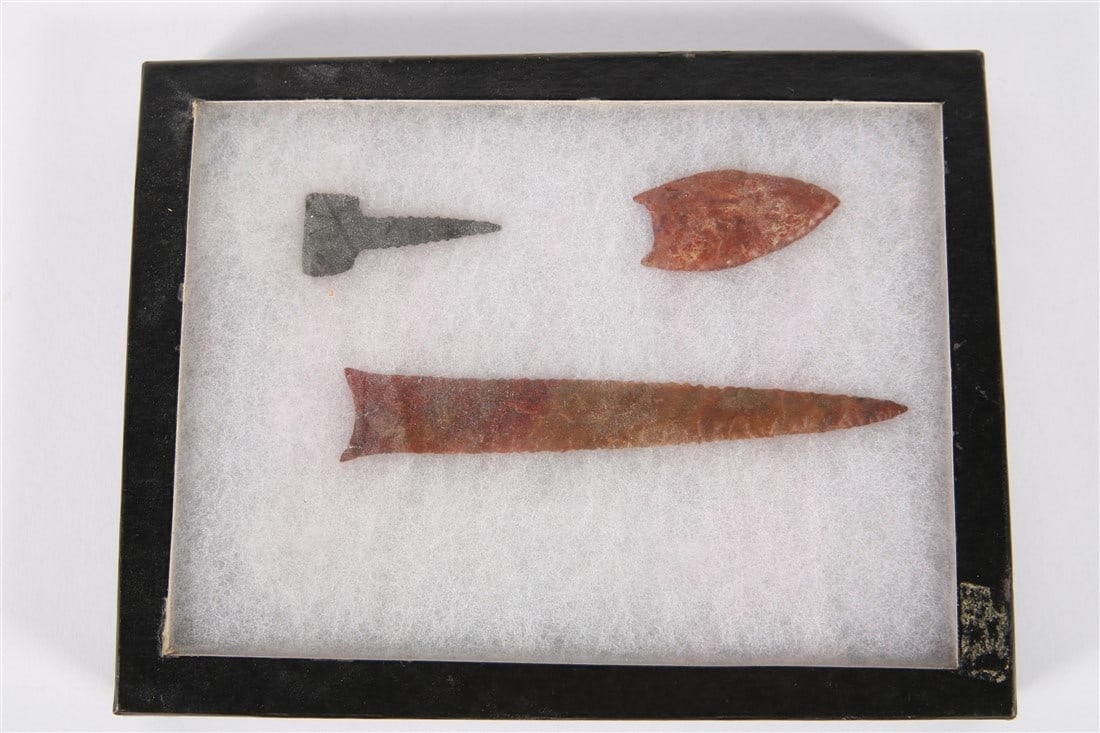 Collection of Three Points: Box: 6 3/4" x 8 7/8". Display box containing three arrowhead points. Largest is 5 5/8" long.