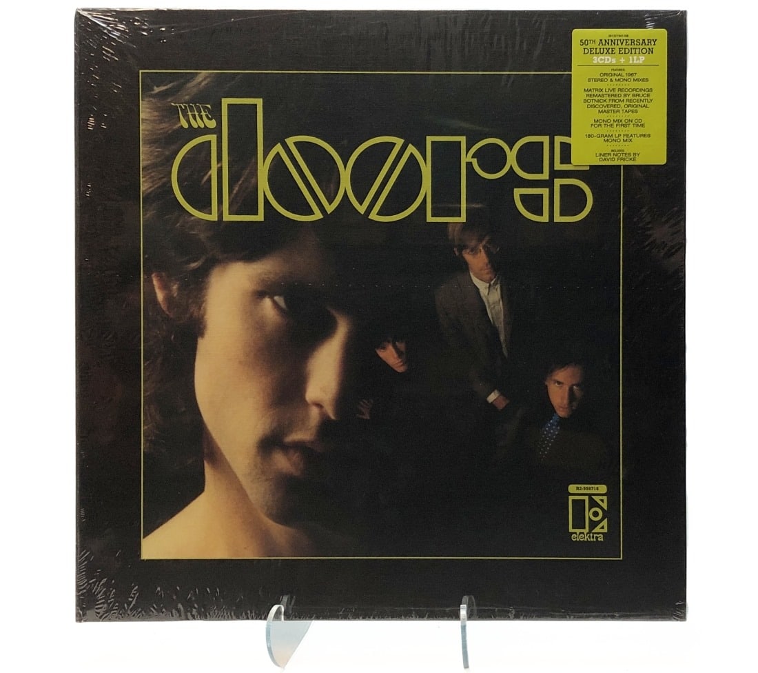 The Doors/The Doors Limited Edition: The Doors/The Doors. Limited numbered edition 50th anniversary deluxe. Includes 3 CDs and 1 LP. No. 29164. Sealed.