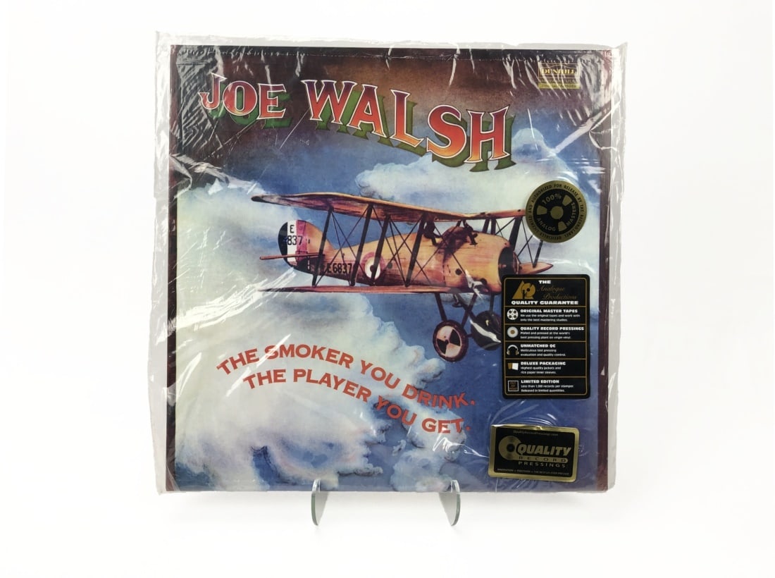 Analogue Productions Joe Walsh/The Smoker ...: Analogue Productions. Joe Walsh/The Smoker You Drink, The Player You Get. Still sealed in original loose bag. Perforation intact.