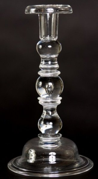 Steuben Glass Baluster Teardrop Candlestick #7746: Steuben glass baluster teardrop candlestick, #7746. American, 20th century. Baluster form candlestick with captured teardrop bubble. Designed by Frederick Carder. Signed under foot. Height 10 1/4". Co