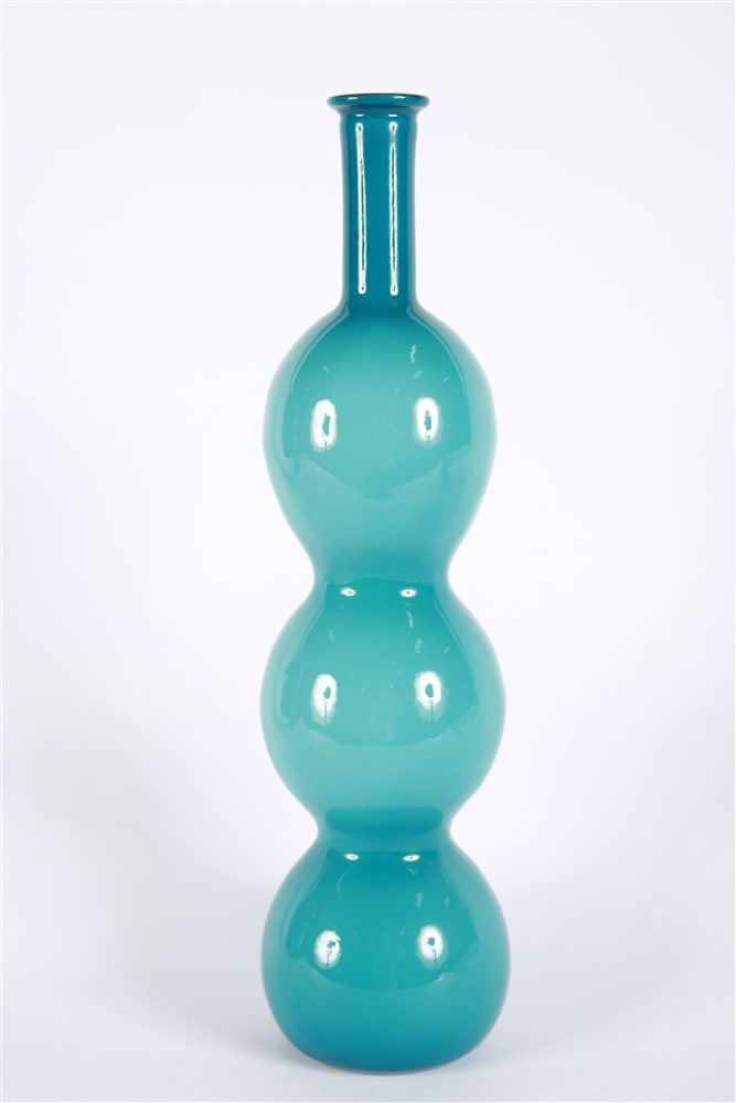Empoli Style Blue Triple Gourd Vase: Glass. Height: 19 1/2", Base Diameter: 5". Empoli style gourd shaped vase comprised of three stacked bubble forms.