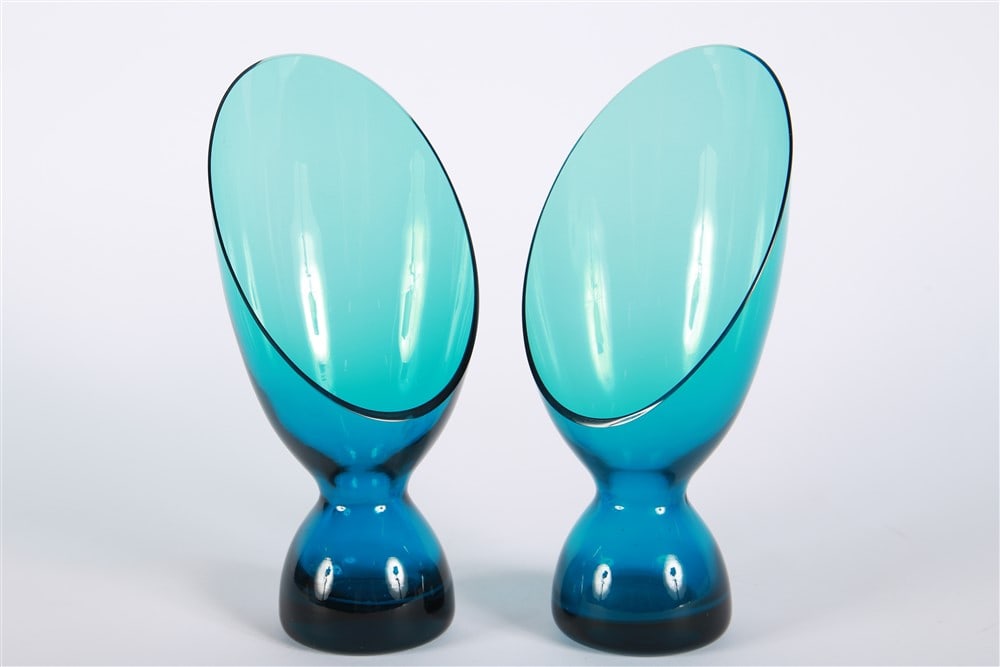 Morgantown, Coronet Slant Candleholder Pair: Morgantown Glass (American, established 1899). Glass. Height: 8 3/4", Length: 4", Depth: 2 1/2". Pair of matching glass candleholders from Morgantown Glass Co. Peacock blue color.
