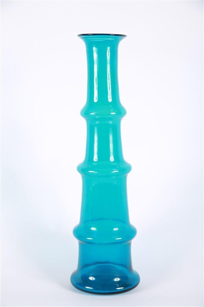 Wayne Husted for Blenko, Blue Glass "Bamboo" Vase: Wayne Husted (American, 20th century). "Bamboo" vase. Glass. Model: 5716. Designed for the Blenko Glass Company. Height: 19 3/4", Base Diameter: 5 1/2". Blue bamboo style vase by Wayne Husted for Blen