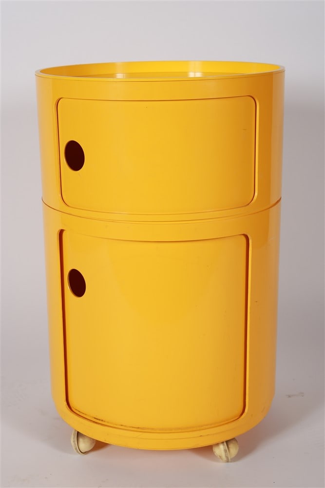 Kartell, Yellow "Componibili" Storage Unit: Anna Castelli Ferrieri (Italian, 1918-2006). "Componibili" storage unit. Plastic. Designed for Kartell. Height: 25 3/4", Diameter: 16 1/4". Modular yellow storage unit with sliding doors. Marked