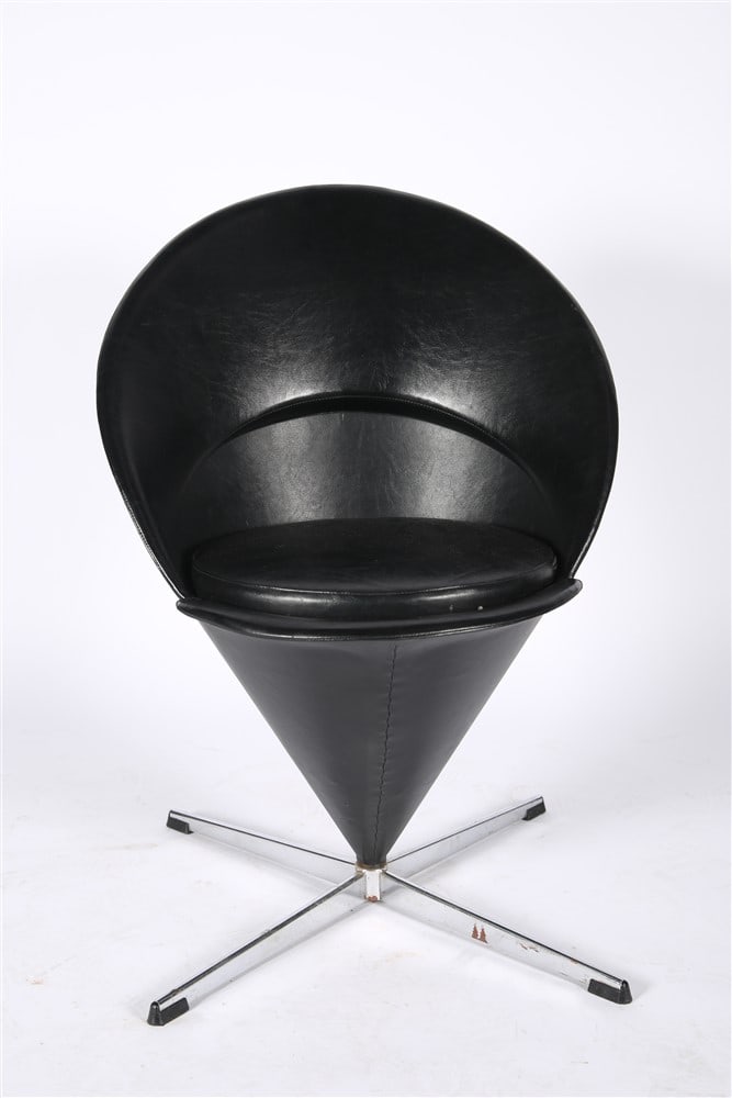 Verner Panton, Black "Cone" Chair: Verner Panton (Danish, 1926-1988). "Cone" chair. Vinyl, metal, plastic. Height: 33 1/4", Length: 28", Depth: 28". Black chair comprised of a steel shell, rising on a stainless steel star base, with