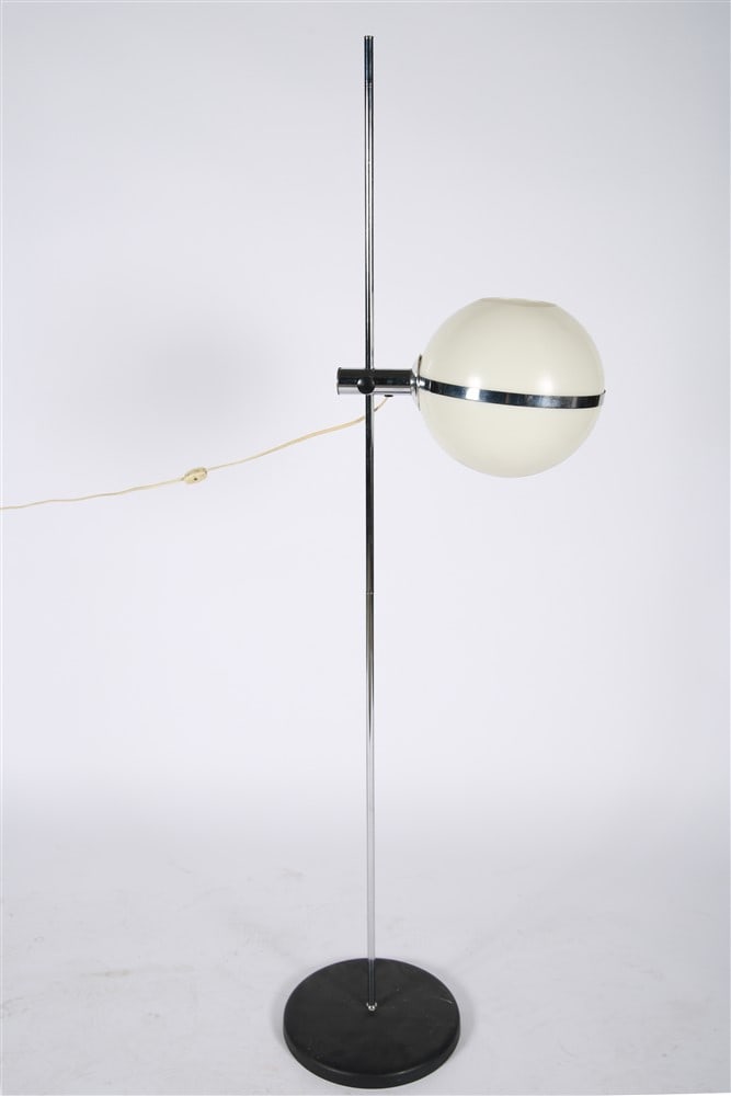 Italian Mid-Century Acrylic Globe Floor Lamp: Chrome, metal, acrylic. Height: 61", Base diameter: 11 1/2". Mid-century style floor lamp comprised of a white acrylic globe bisected by a chrome band and mounted on a metal stem. Adjustable light and