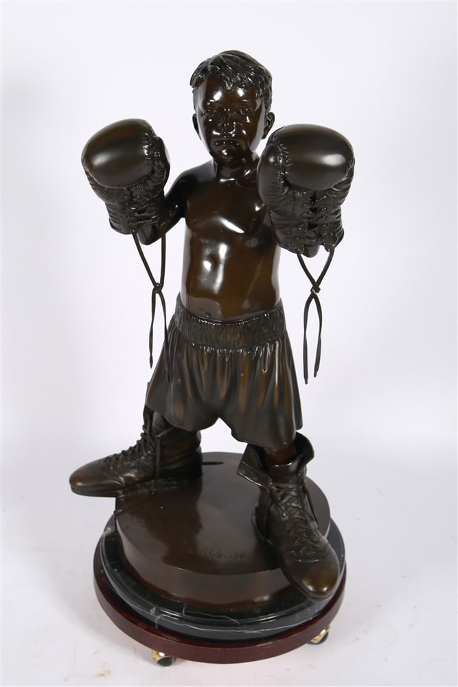 Jim Davidson Company, "Little Champ" Bronze: Jim Davidson Company (Thai, established 20th century). "Little Champ". Bronze, marble. Height: 40", Length: 22 1/2". Bronze sculpture of a young boy posed as a boxer. On a marble base and signed "Jim 