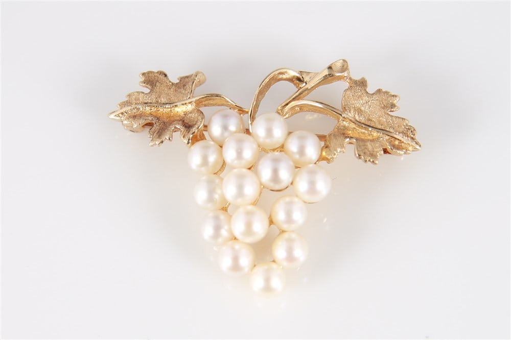 14k Yellow Gold and Pearl Grape Brooch: 14k yellow gold, pearl. Height: 1", Length: 1 3/8". Weight: 6.7 grams. 14K yellow gold and pearl brooch in the form of grapes. Stamped "14K" at back. Total weight including pearls: 6.7 grams.