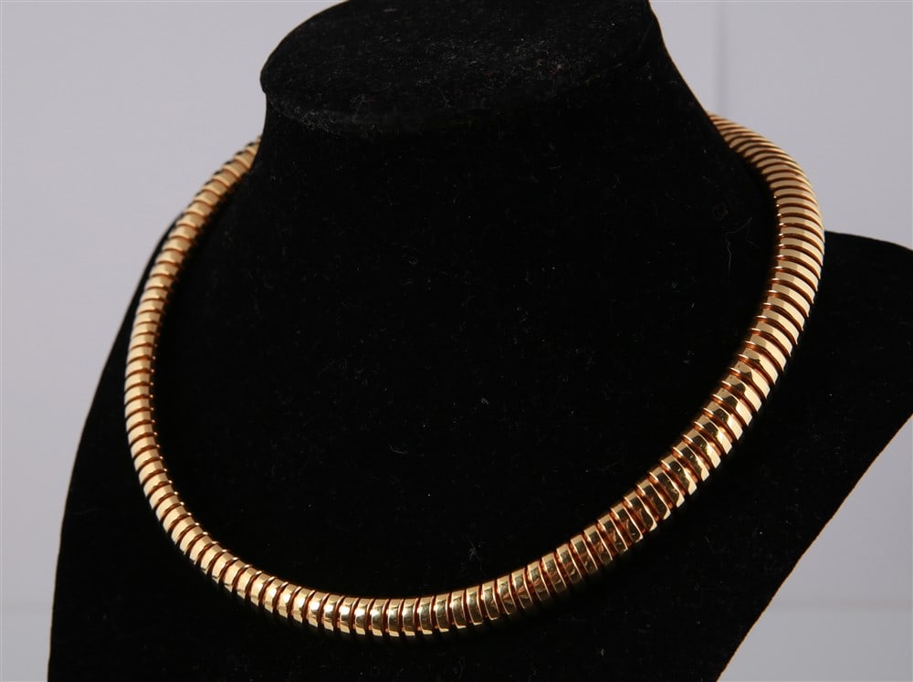 Verdura, 18k Yellow Gold Snake Necklace: Verdura, 18k yellow gold snake necklace with sapphire and diamond clasp. 18k yellow gold necklace set with 14 square-cut sapphires weighing 1.03 carats and 5 square-cut diamonds weighing .30 carats. O
