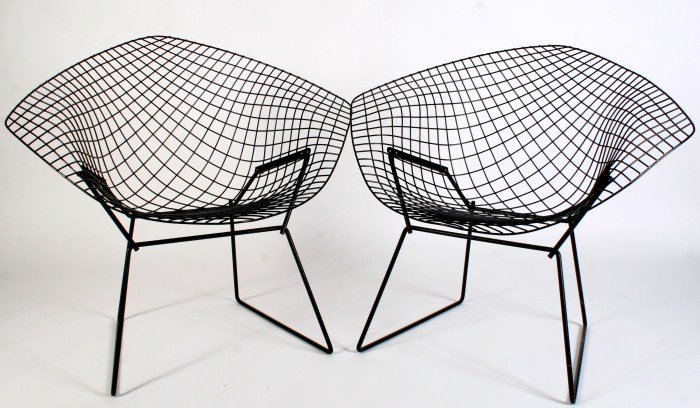 Pair Harry Bertoia Diamond Chairs By Knoll: Pair Harry Bertoia diamond chairs. American, 20th century. Made by Knoll. Height 30", width 33", depth 31 1/2". Condition: Minor scratches to the finish of both chairs.