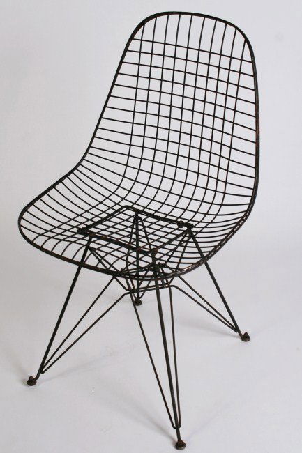 Charles & Ray Eames DKR "Eiffel Tower" Chair: Charles and Ray Eames DKR "Eiffel Tower" chair. American, 20th century. Made by Herman Miller. Height 32", width 19 1/2", depth 21". Condition: The finish surrounding the edge of the seat and back is