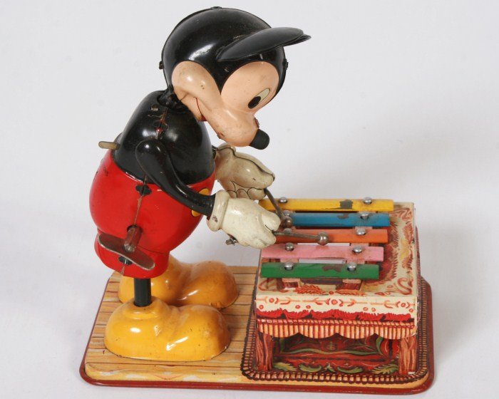 Wind-Up Mickey Mouse Xylophone Player: Line Mar Toys lithographed tin wind-up Mickey Mouse xylophone player. Japanese, 20th century. Copyright Walt Disney. Height 6 1/4". Condition: With general wear, scratches, and scuffing. Not in workin