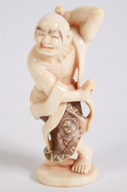 Carved Ivory Netsuke, Japanese, 20th C.: Carved ivory netsuke. Japanese, 20th century. Depicting a warrior with a club. Signed on the bottom. Height 3 1/4". Condition: Appears fine.