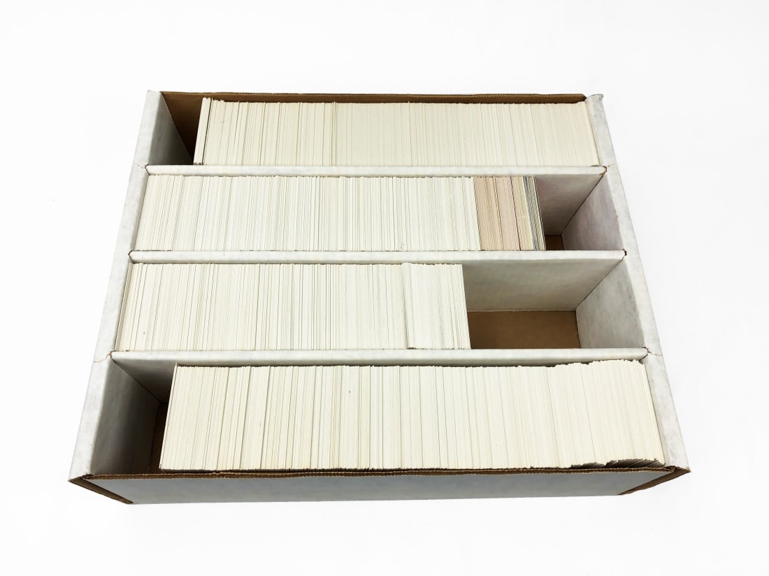 2,500 1992 Topps Baseball Cards in Collector's Box: Approximately 2,500 baseball cards from the 1992 MLB season by Topps, with 20 - 30 from the Fleer 1990 Action Series in a cardboard collector's case.