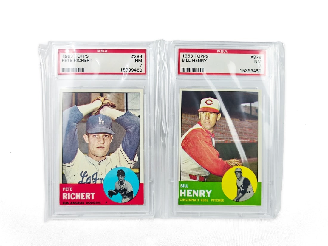 Set of 2 PSA Graded 1963 Topps Baseball Cards: Both cards are by Topps for the 1963 MLB seasons. Both cards have been graded and slabbed by PSA. Included players: Pete Richert - PSA 7 Bill Henry - PSA 7
