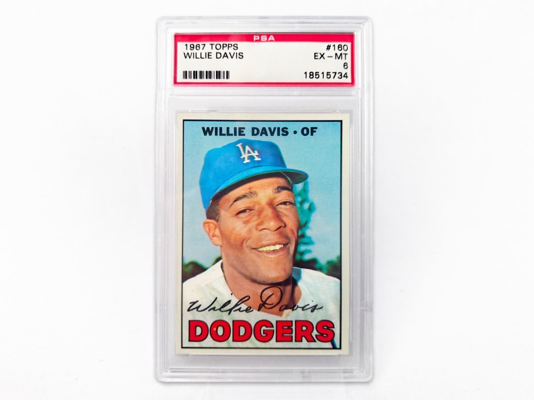 1967 Topps Willie Davis Baseball Card - PSA 6: A Willie Davis baseball card for the 1967 MLB season by Topps. The card has been slabbed and graded a 6 by PSA.