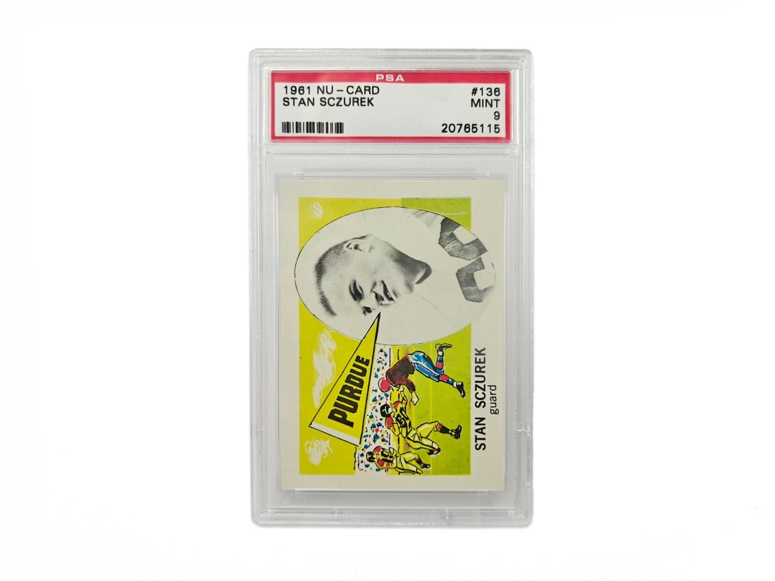 1961 Nu-Card Stan Sczurek Foodball Card - PSA 9: A 1961 Stan Sczurek college football card by Nu-Card that has been slabbed and graded a 9 by PSA.