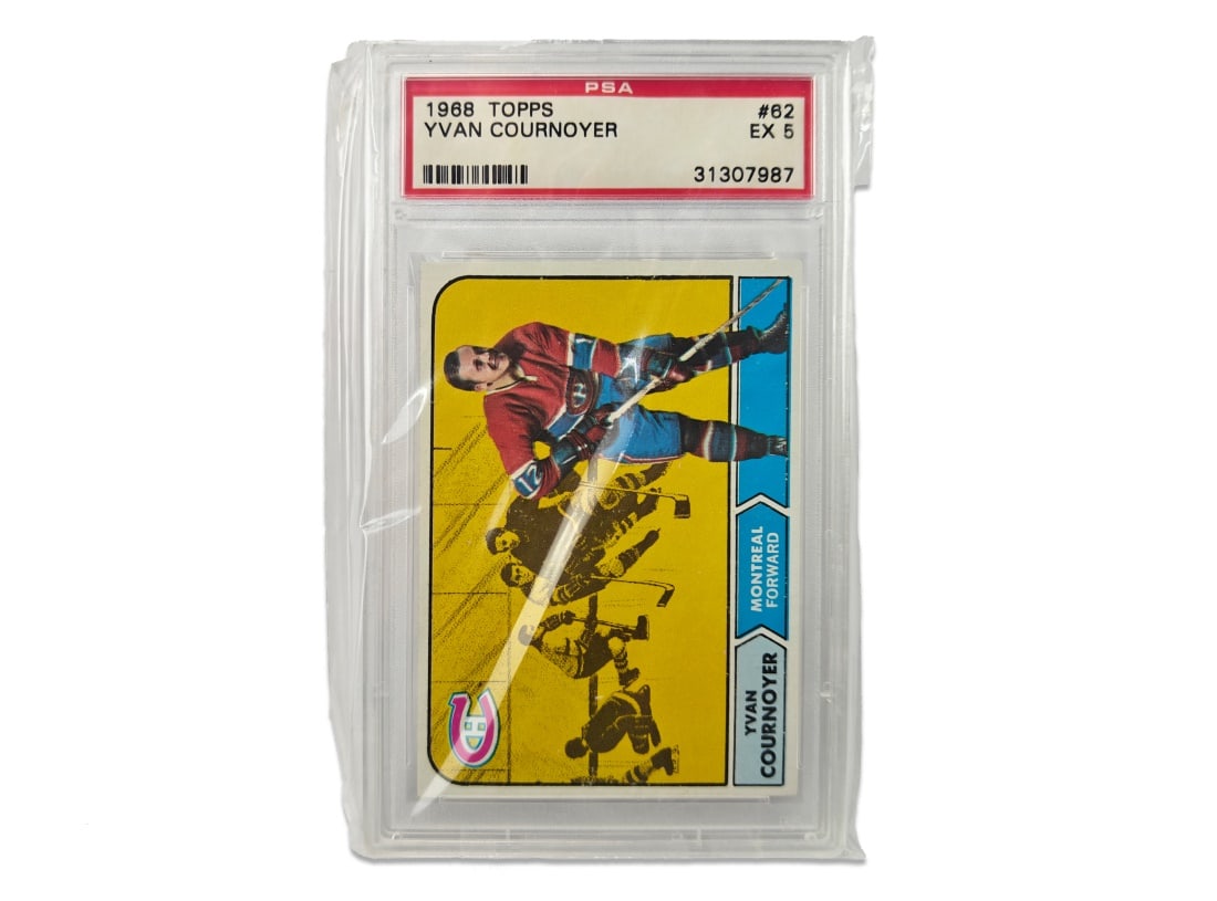 1968 Topps Yvan Cournoyer NHL Hockey Card - PSA 9: A 1968 Yvan Cournoyer card by Topps that has been slabbed and graded a 9 by PSA.