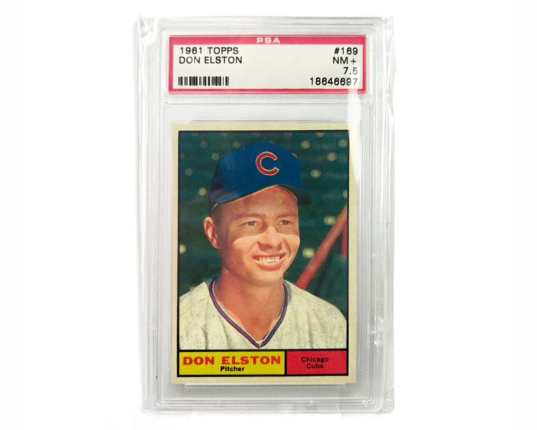 1961 Topps Don Elston Baseball Card - PSA 7.5: A Don Elston baseball card for the 1961 MLB season by Topps. The card has been slabbed and graded a 7.5 by PSA.