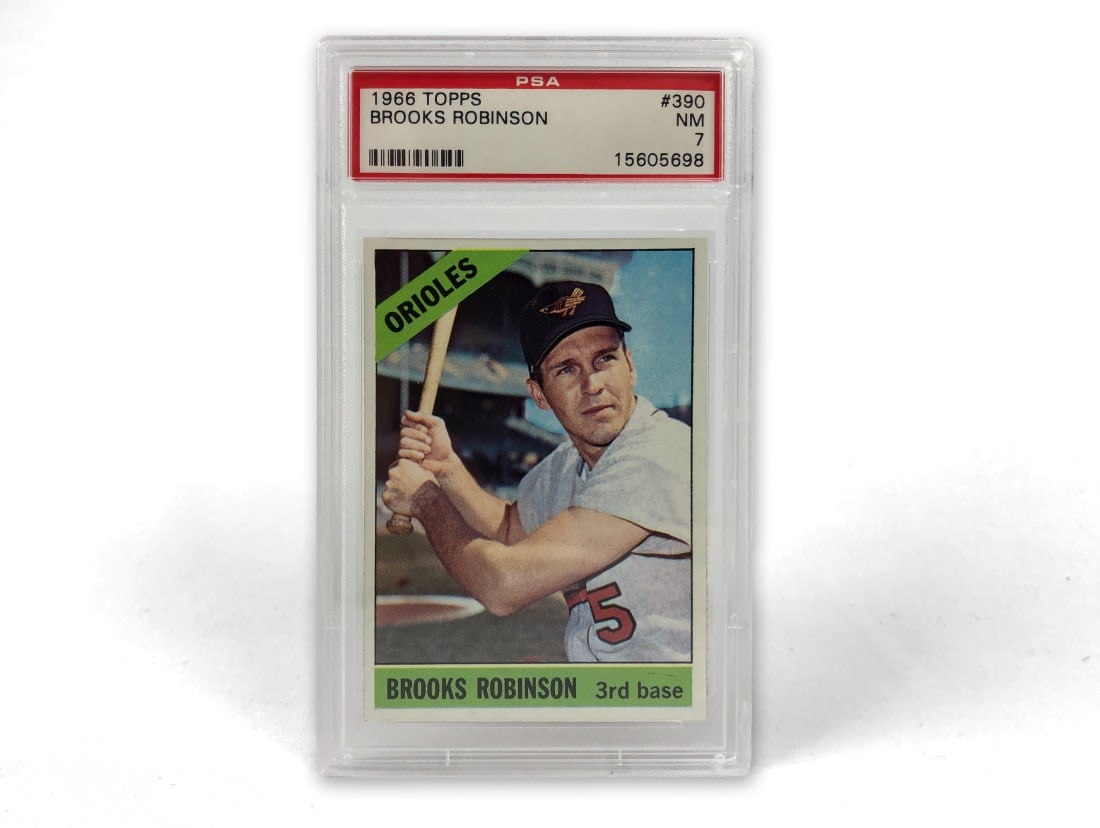 1966 Topps Brooks Robinson Baseball Card - PSA 7: A 1966Brooks Robinson MLB baseball card by Topps that has been slabbed and graded a 7 by PSA.