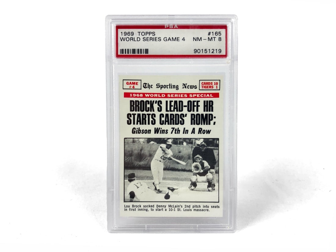 1969 Topps World Series Game 4 Card - PSA 8: A 1969 World Series Game 4 MLB baseball card by Topps that has been slabbed and graded a 8 by PSA.