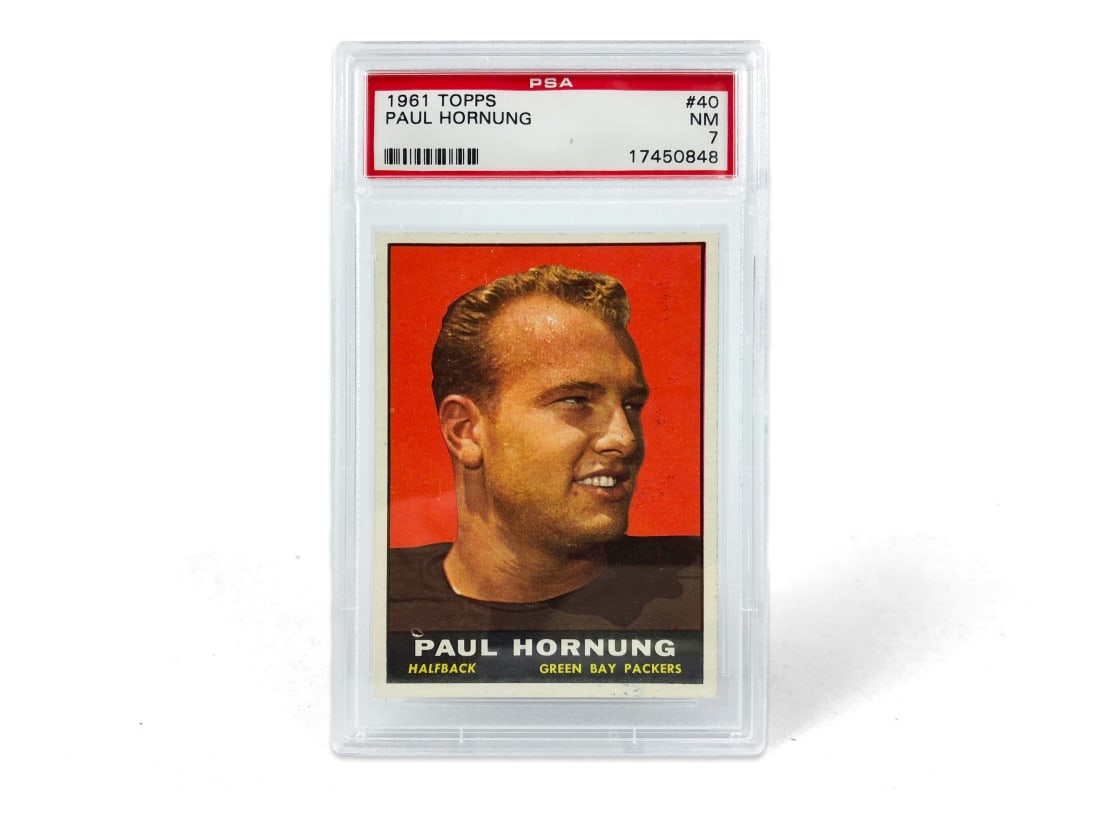 1961 Topps Paul Hornung Football Card - PSA 7: A 1961 Paul Hornung NFL football card by Topps that has been slabbed and graded a 7 by PSA.