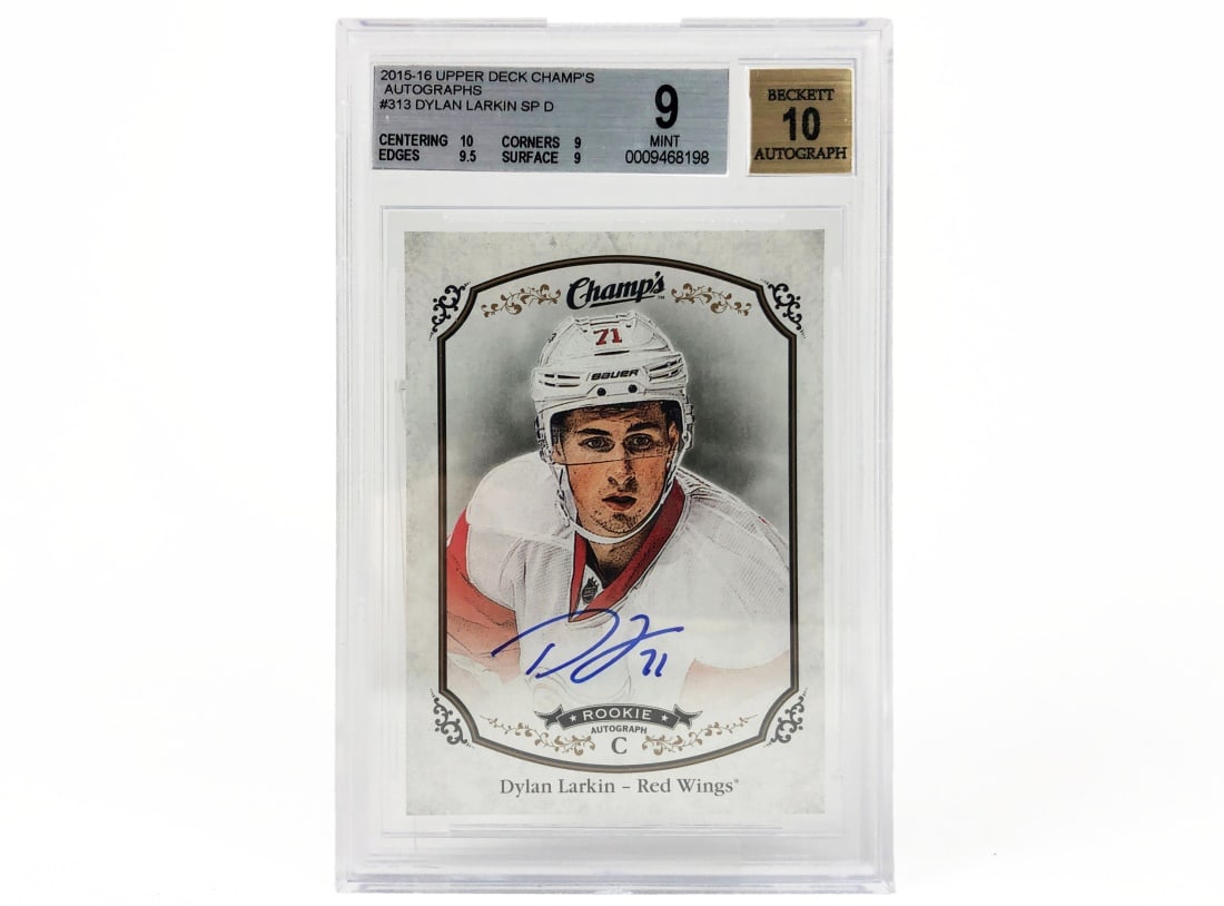 2016 Upper Deck Chams Dylan Larkin Signed Card: A 2015 - 2016 Dylan Larkin signed Upper Deck Champ's NHL hockey card by Topps that has been slabbed and graded a 9 by Beckett.