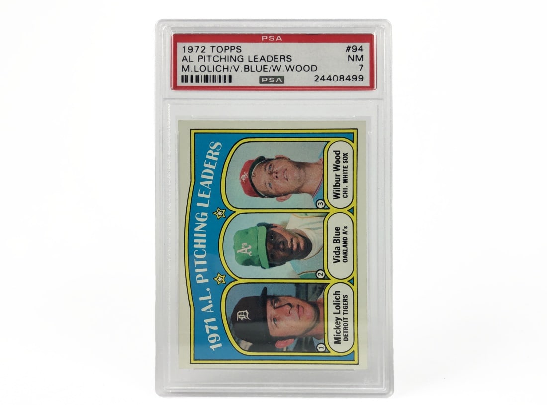 1972 Topps AL Pitching Leaders Baseball Card PSA 7: A 1972 American League Pitching Leaders MLB baseball card by Topps, featuring Mickey Lolich, Vida Blue, Wilbur Wood. It has been slabbed and graded an 7 by PSA.