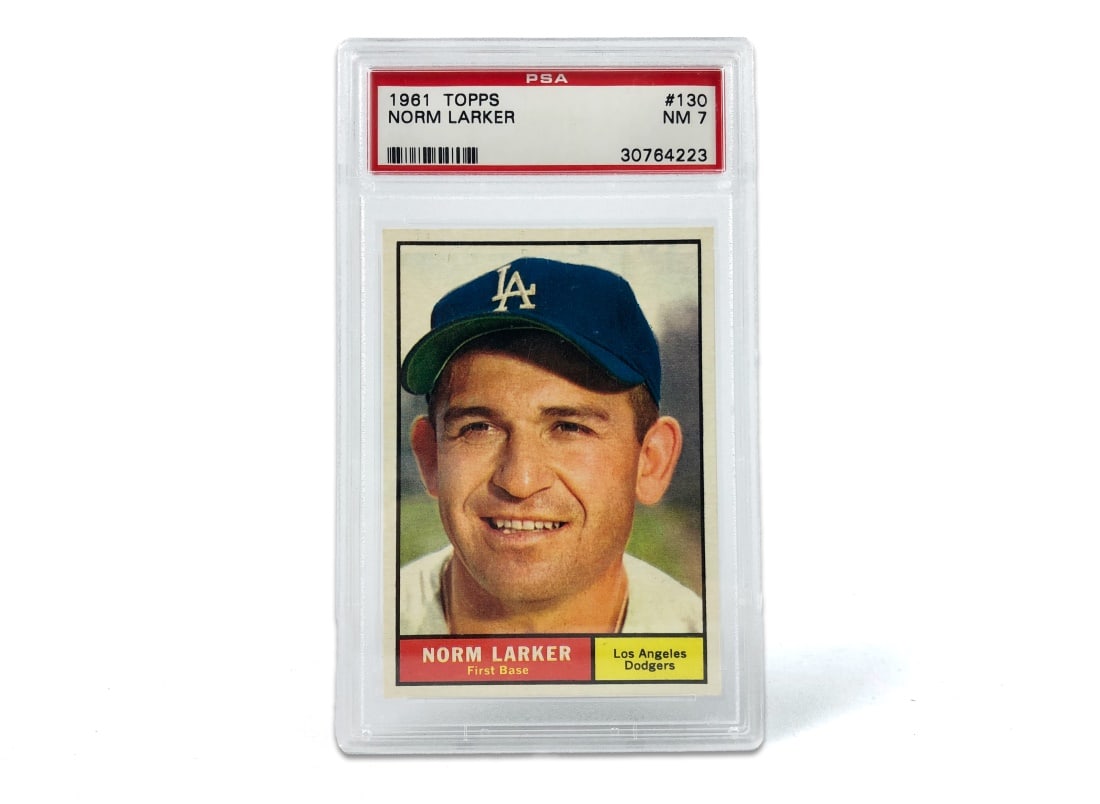 1961 Topps Norm Larker Baseball Card - PSA 7: A 1961 Norm Larker MLB baseball card by Topps that has been slabbed and graded a 7 by PSA.