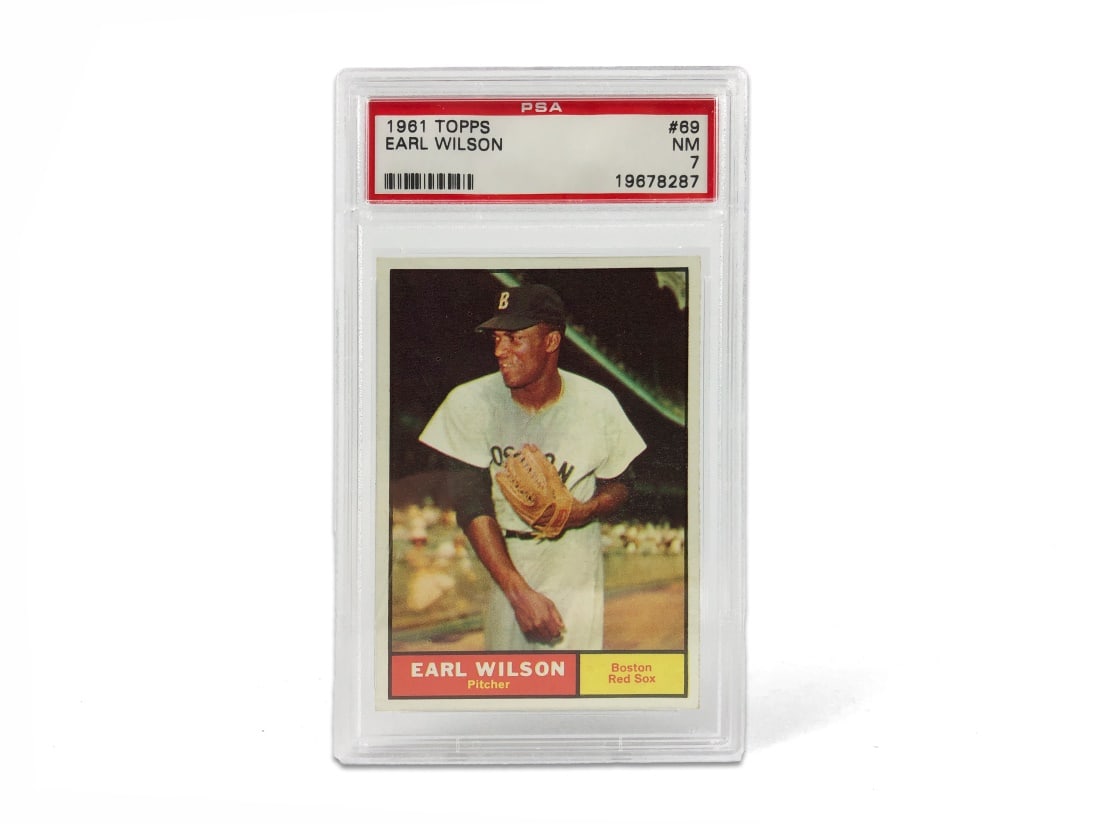 1961 Topps Earl Wilson Baseball Card - PSA 7: A 1961 Earl Wilson MLB baseball card by Topps that has been slabbed and graded a 7 by PSA.