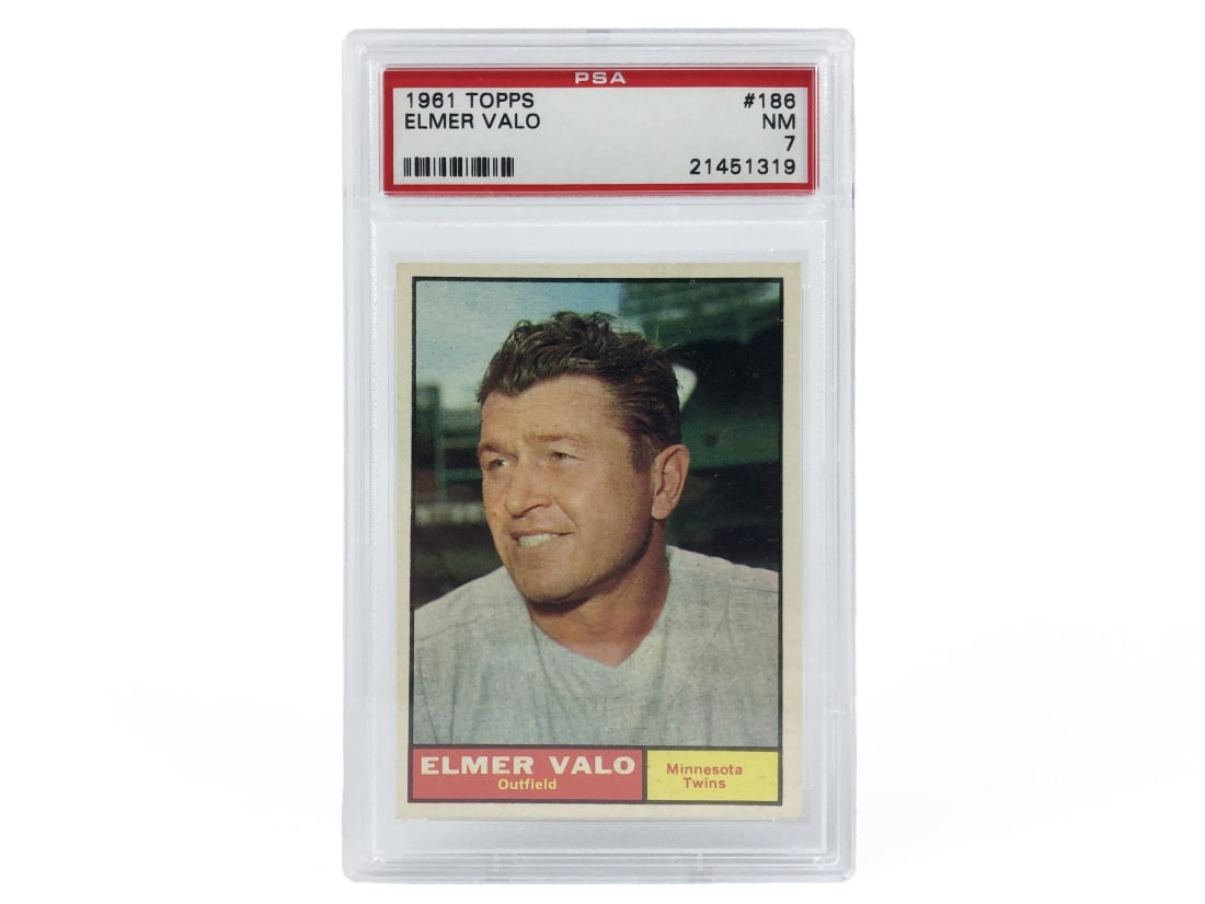 1961 Topps Elmer Valo Baseball Card - PSA 7: A 1961 Elmer Valo MLB baseball card by Topps that has been slabbed and graded a 7 by PSA.