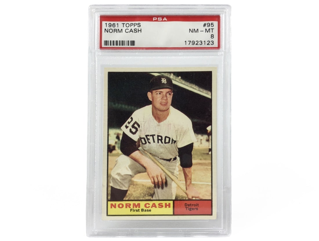 1961 Topps Norm Cash Baseball Card - PSA 8: A 1961 Norm Cash MLB baseball card by Topps that has been slabbed and graded an 8 by PSA.