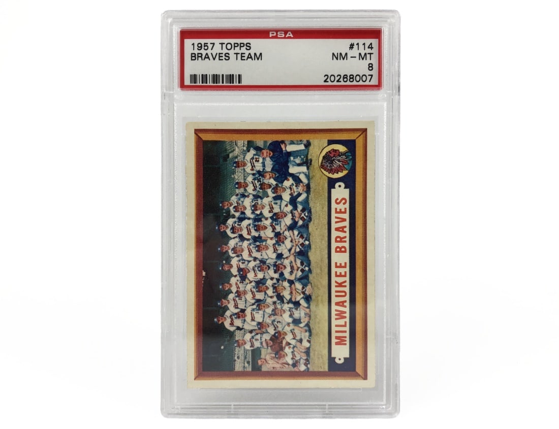 1957 Topps Braves Team Card - PSA 8: A 1957 Milwaukee Braves MLB baseball card by Topps that has been slabbed and graded an 8 by PSA.